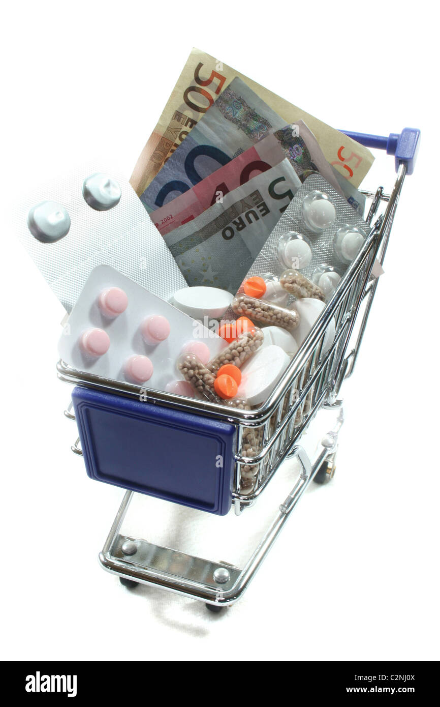 Shopping Cart with tablets and euro notes Stock Photo