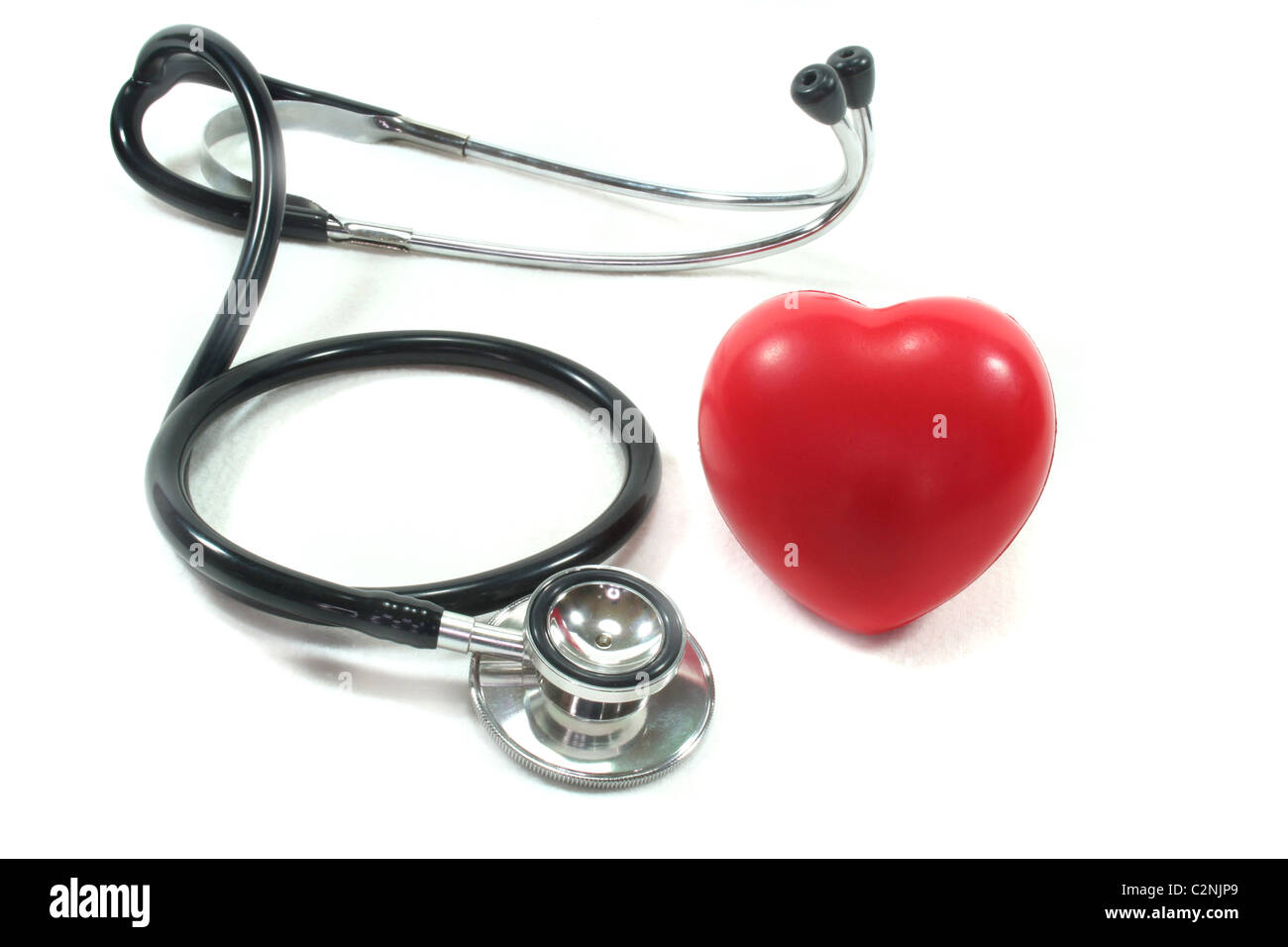Stethoscope with red heart on a white background Stock Photo - Alamy