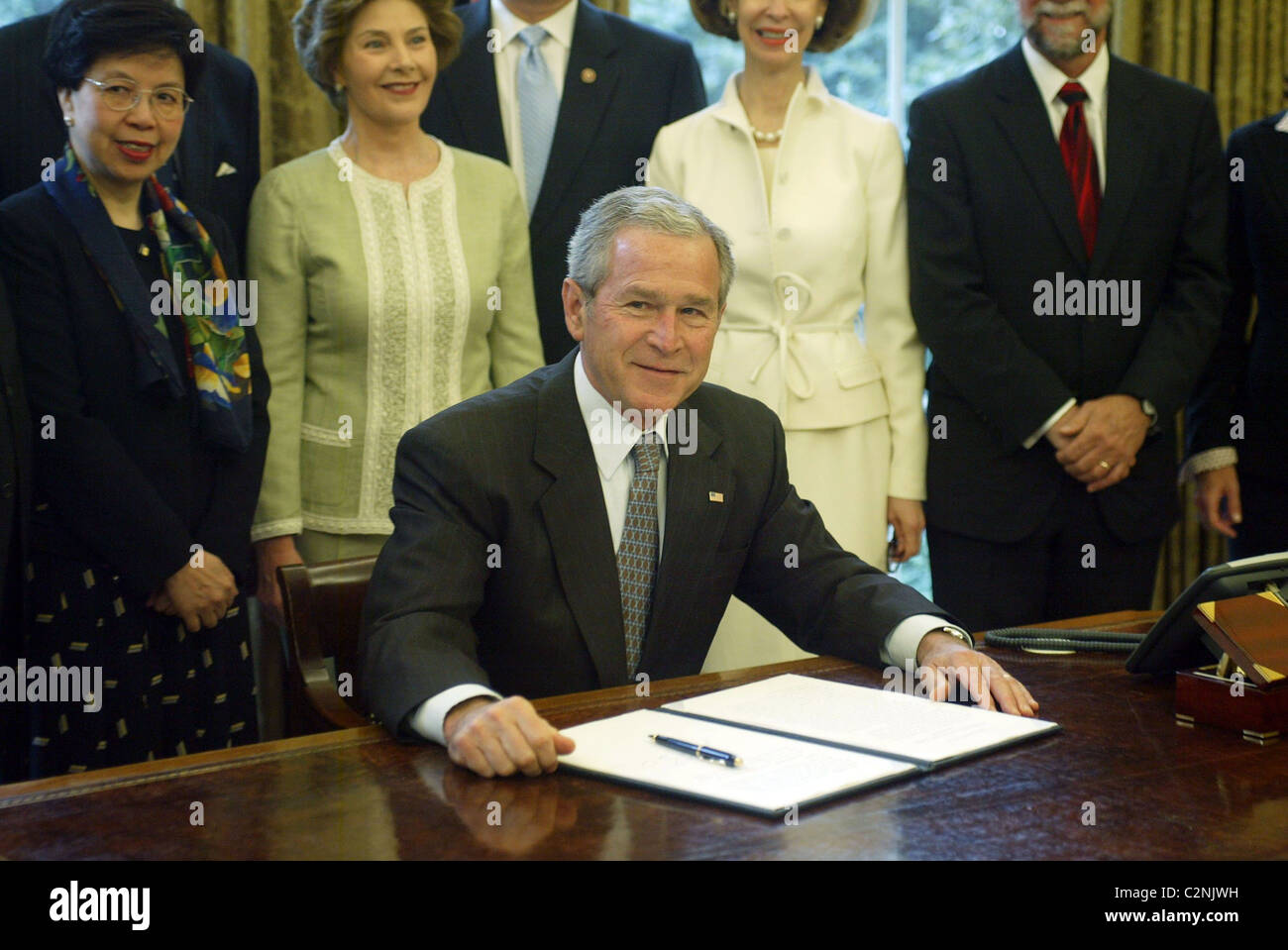 President George Bush signing a bill for Malaria Awareness Washington ...