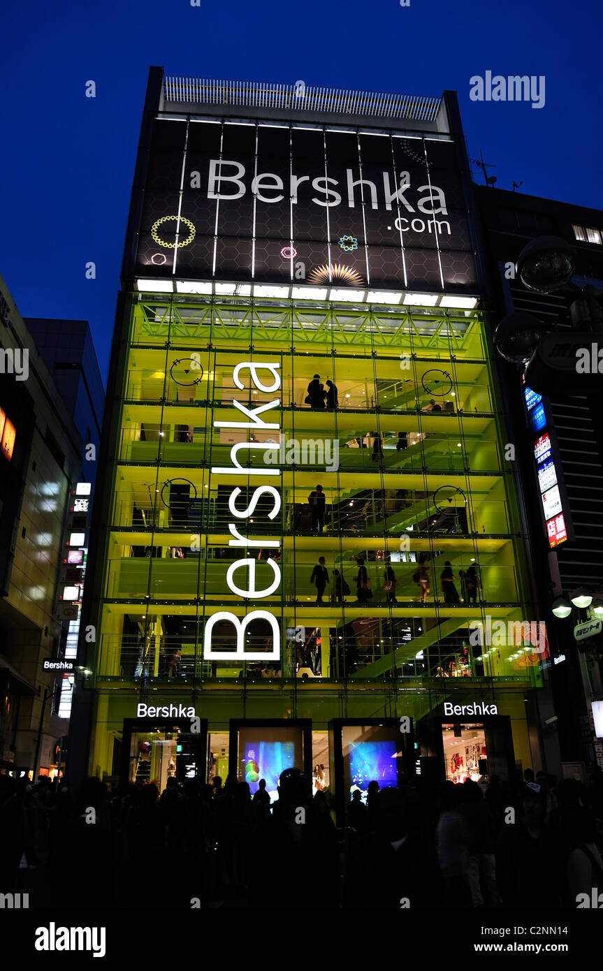 Evening shot of yellow illuminated new Bershka fashion store in Shibuya on  opening day - April 15, 2011 - (Tokyo, Japan Stock Photo - Alamy
