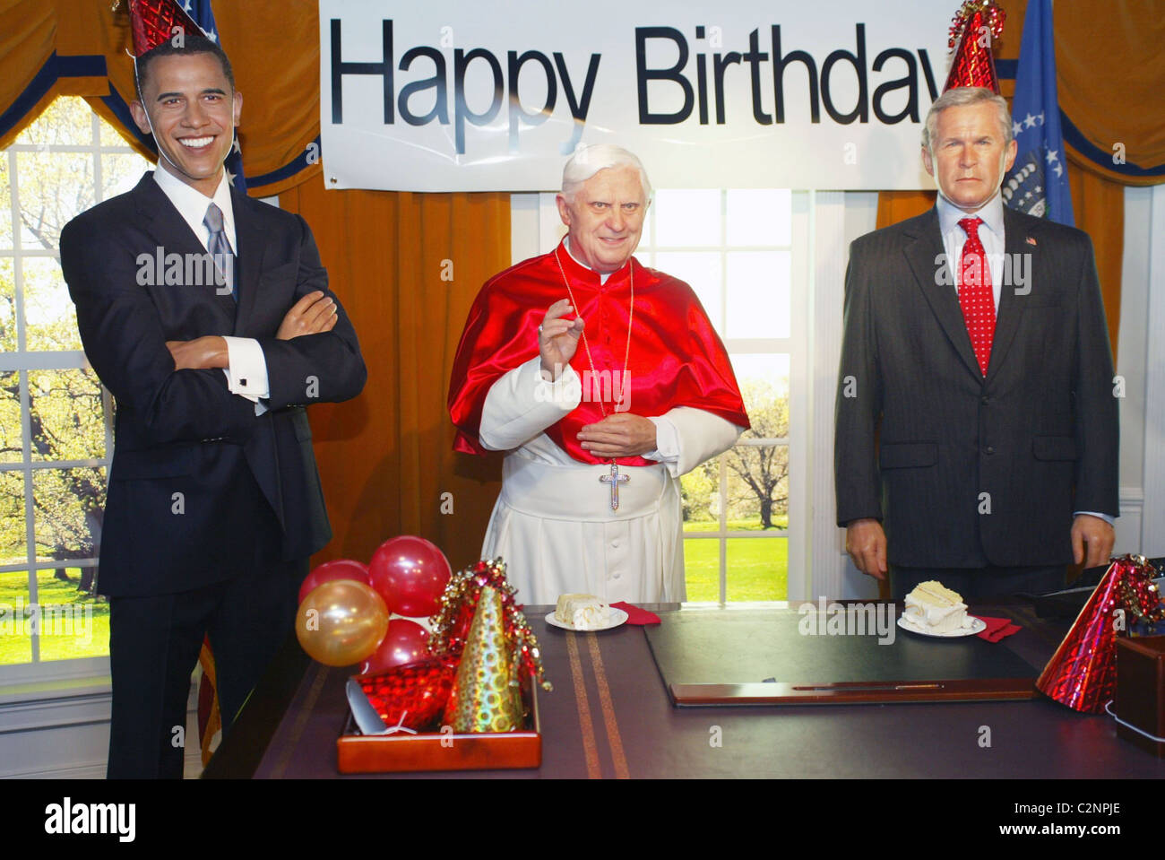 Senator Barak Obama wax figure,  Pope Benedict XVI wax figure and U.S. President George W. Bush wax figure  Madame Tussauds Stock Photo