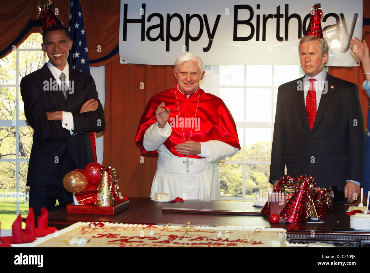 Senator Barak Obama wax figure,  Pope Benedict XVI wax figure, and U.S. President George W. Bush wax figure Madame Tussauds Stock Photo