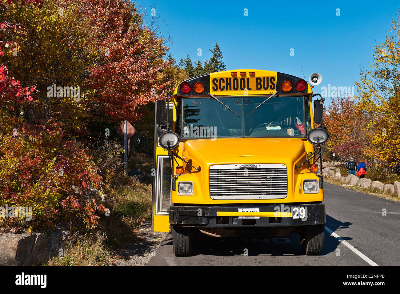 School bus making a stop. Stock Photo