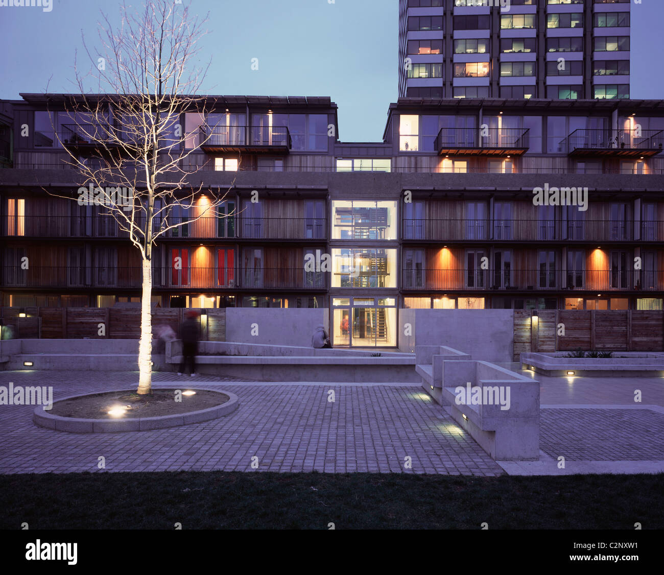 Iroko Housing Scheme, South Bank London. Glazed entrance hall at dusk. Stock Photo