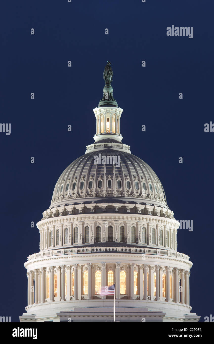 Lights illuminate the US Capitol Building at twilight in Washington, DC. Stock Photo