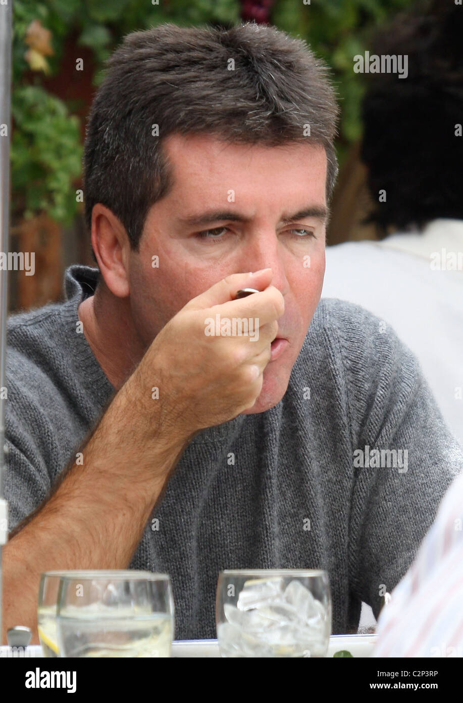 Paparazzi simon cowell hi-res stock photography and images - Alamy