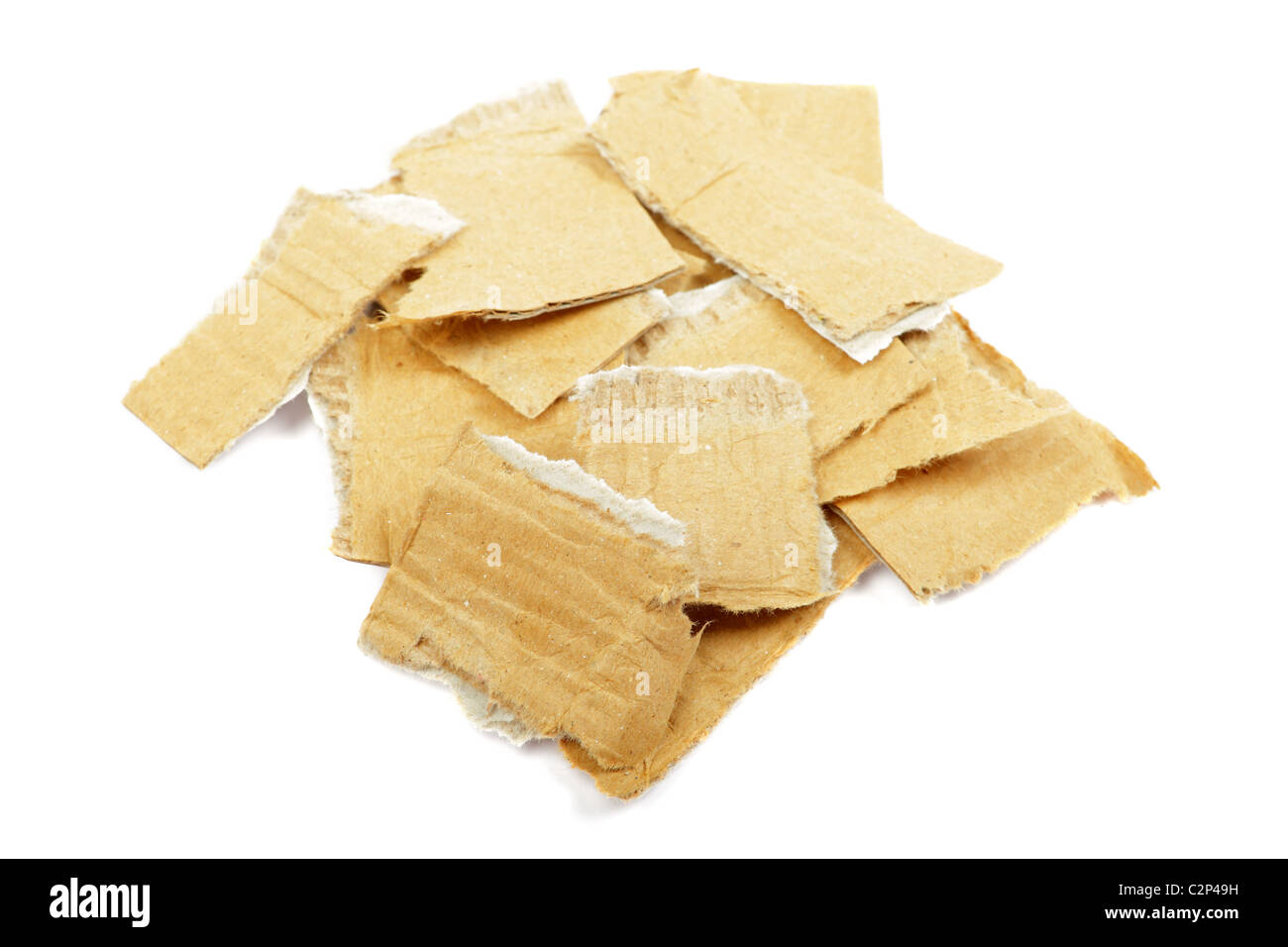 Heap of torned cardboard isolated on the white background. Stock Photo