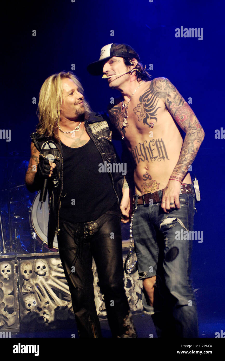 Vince Neil and Tommy Lee Motley Crue performing live at the Apollo  Hammersmith London, England  Stock Photo - Alamy