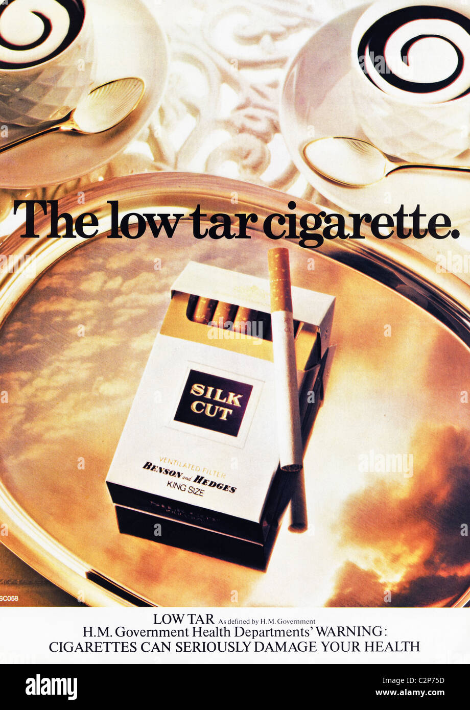 low tar cigarettes Advertisement for SILK CUT KING SIZE filter tip low tar cigarettes in men's  magazine circa 1978 Stock Photo