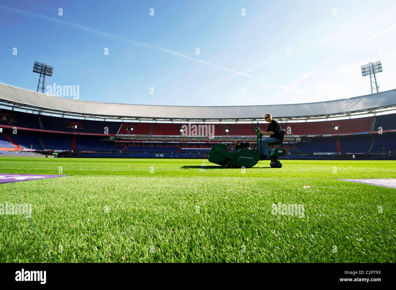 HOLLAND-ROTTERDAM-Groundsman at work at football stadium 'De Kuip', home of Feyenoord. The pitch is the best in Holland. Stock Photo