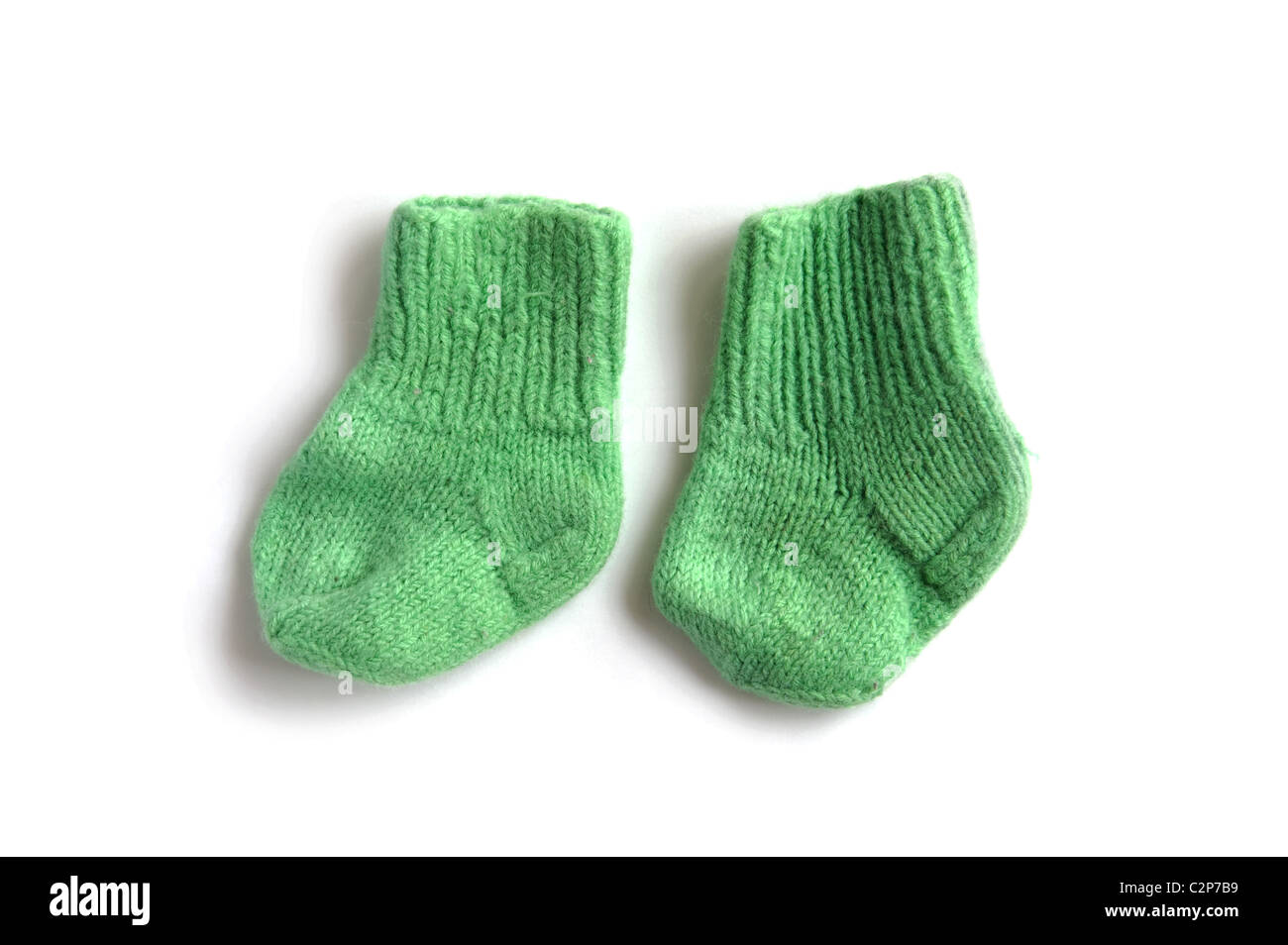 object on white children knitted socks Stock Photo Alamy