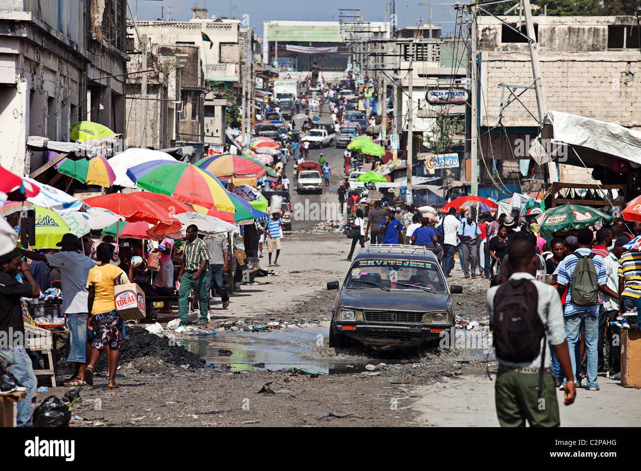 Crowded unsealed street in Delmas, Port Au Prince, Haiti one year after the earthquake Stock Photo