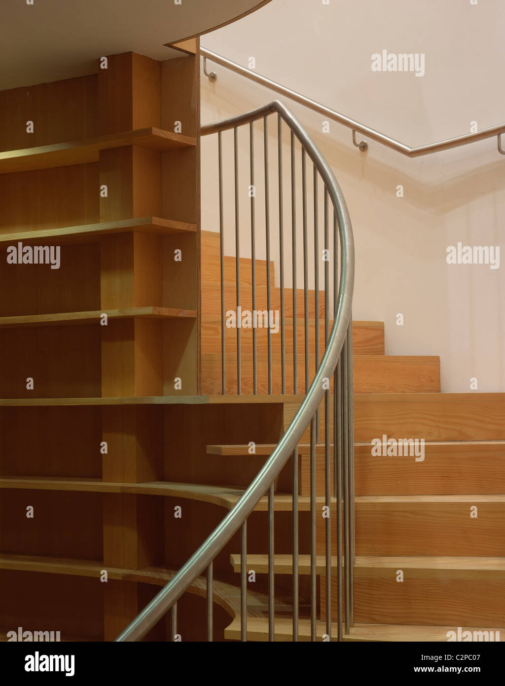 Maggie's Centre, Ninewells Hospital, Dundee, Scotland. Library book shelving by stairs. Stock Photo