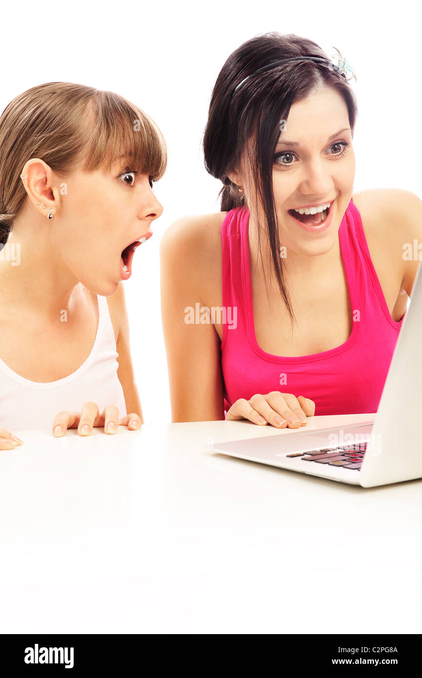 Two Teen Girls With Laptop Isolated On White Background They Are 