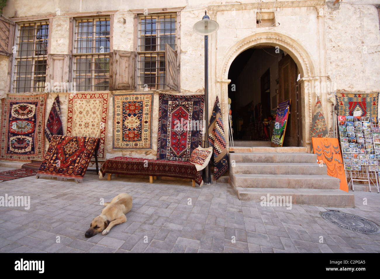 Sale of carpets in the street in Antalya Stock Photo - Alamy