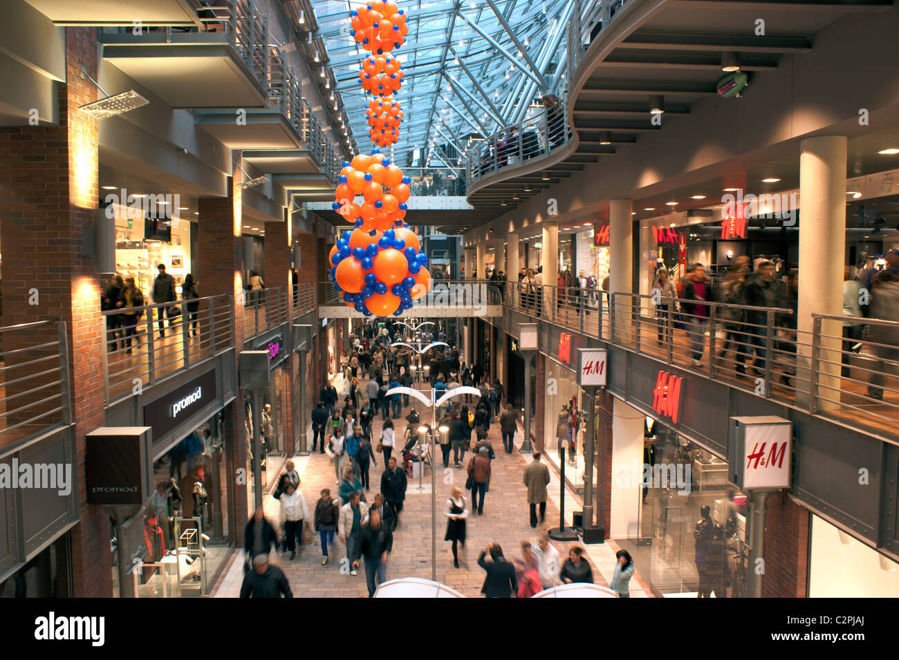 Shopping male in gallery supermarket Stock Photo Alamy