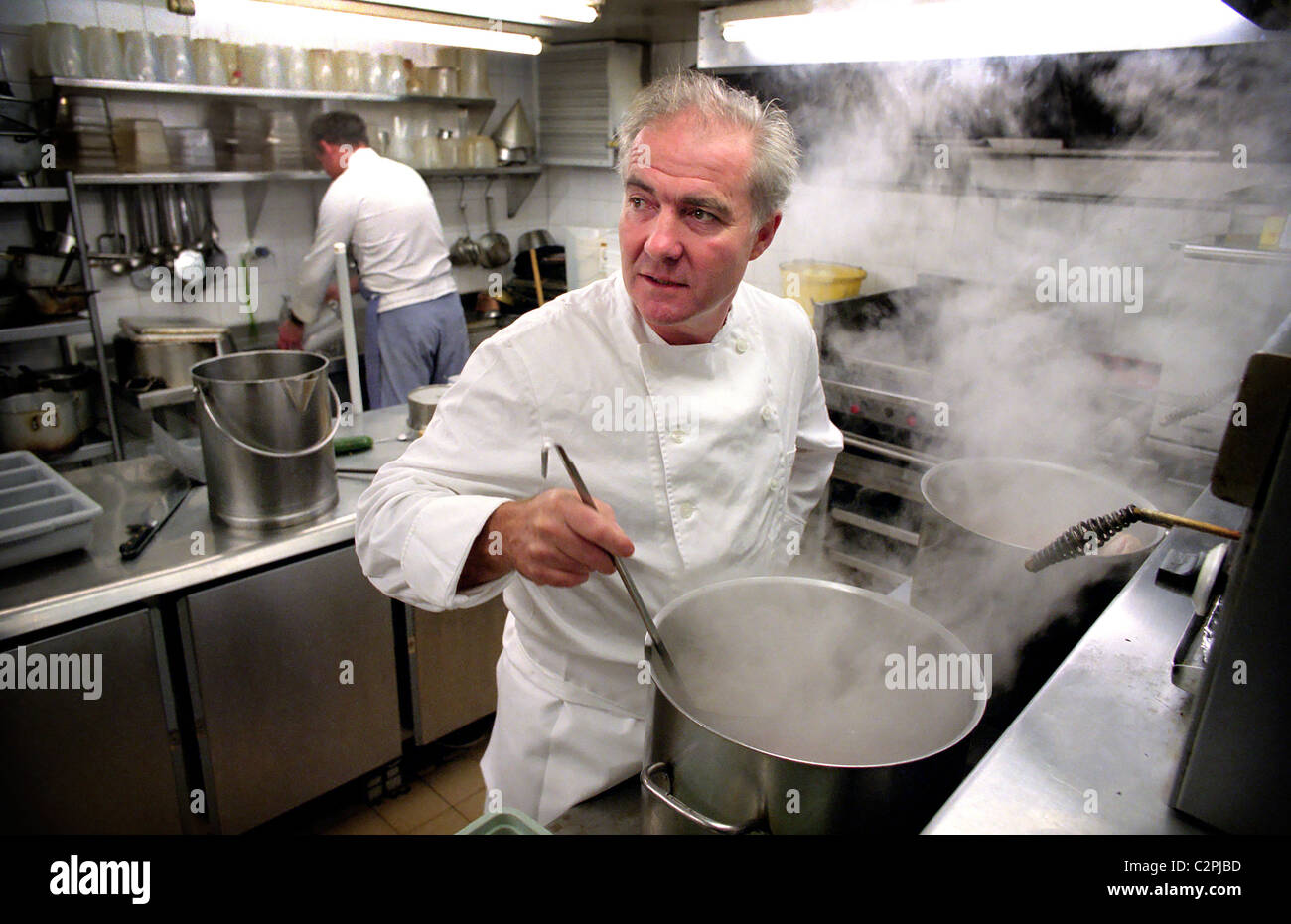 Chef Rick Stein int he kitchen of his Padstow restaurant. Stock Photo