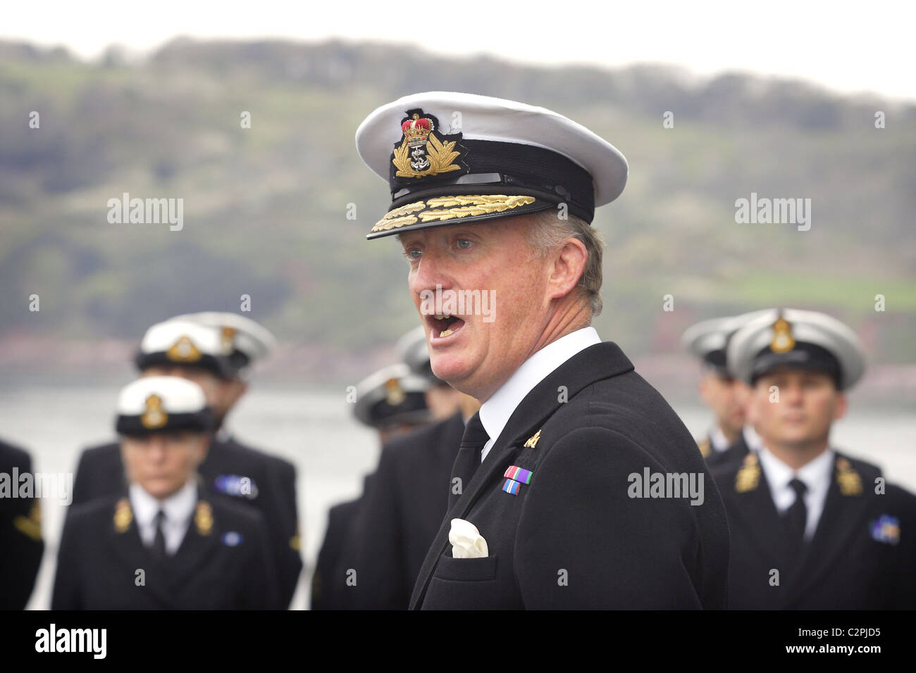 Rear Admiral Chris Snow addressing the ship's company aboard HMS Cumberland. Stock Photo