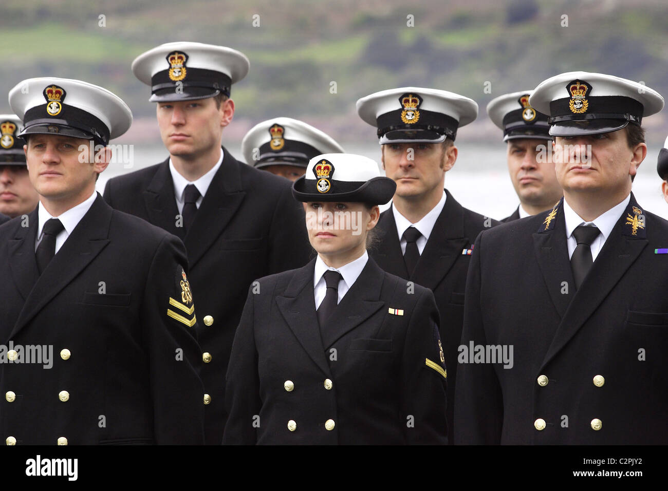 Members of HMS Cumberland's crew prepare to leave the ship after a 7 month deployment. Stock Photo
