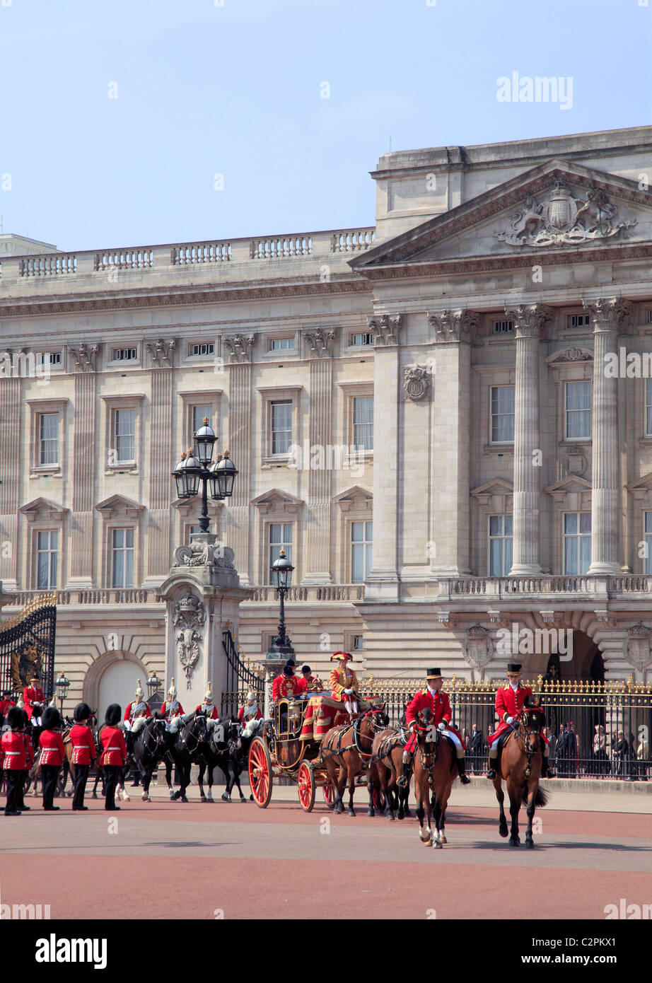 Royal Coach and Horses leave Buckingham Palace in London Stock Photo