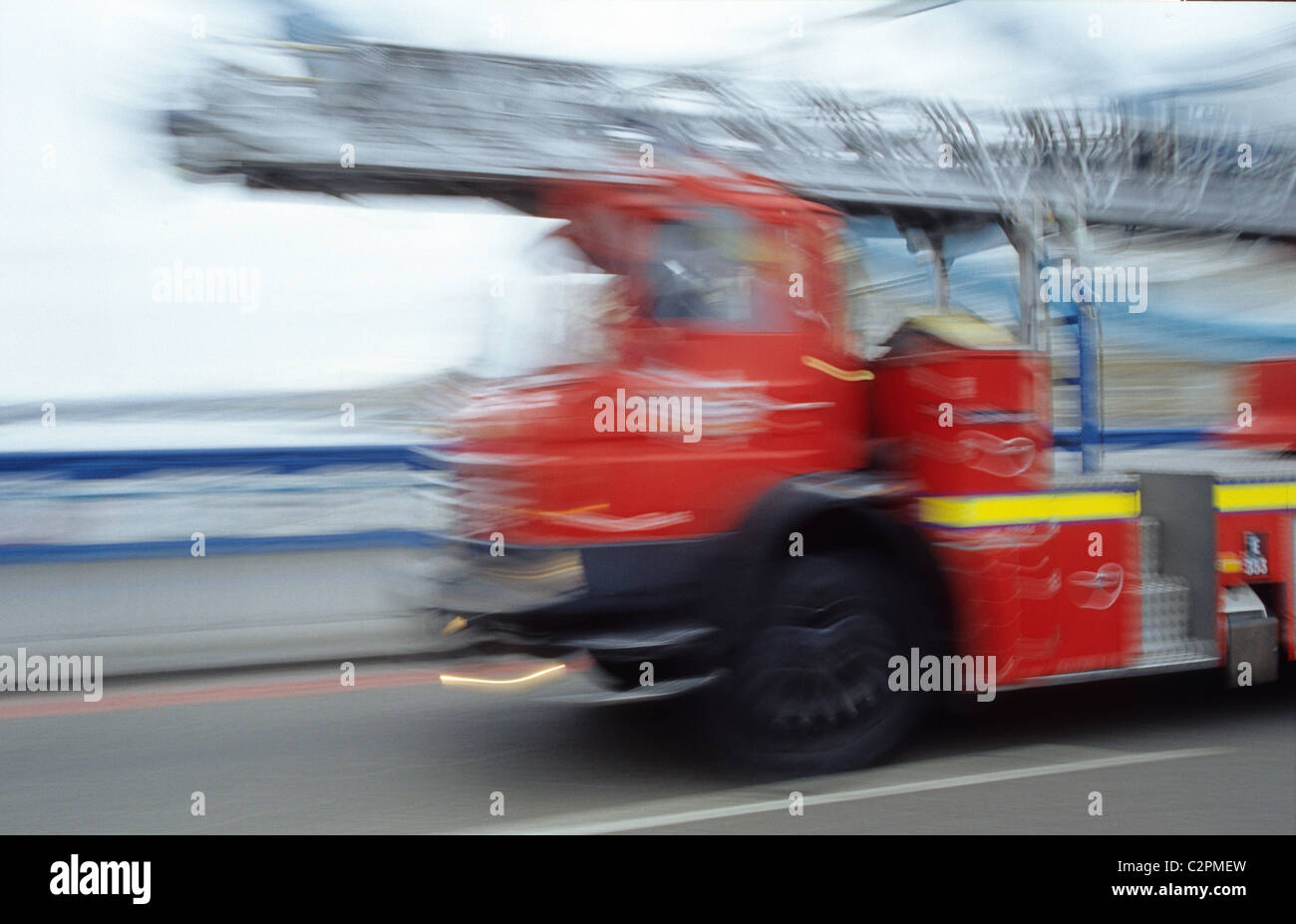 London - red fire truck on Tower Bridge Stock Photo
