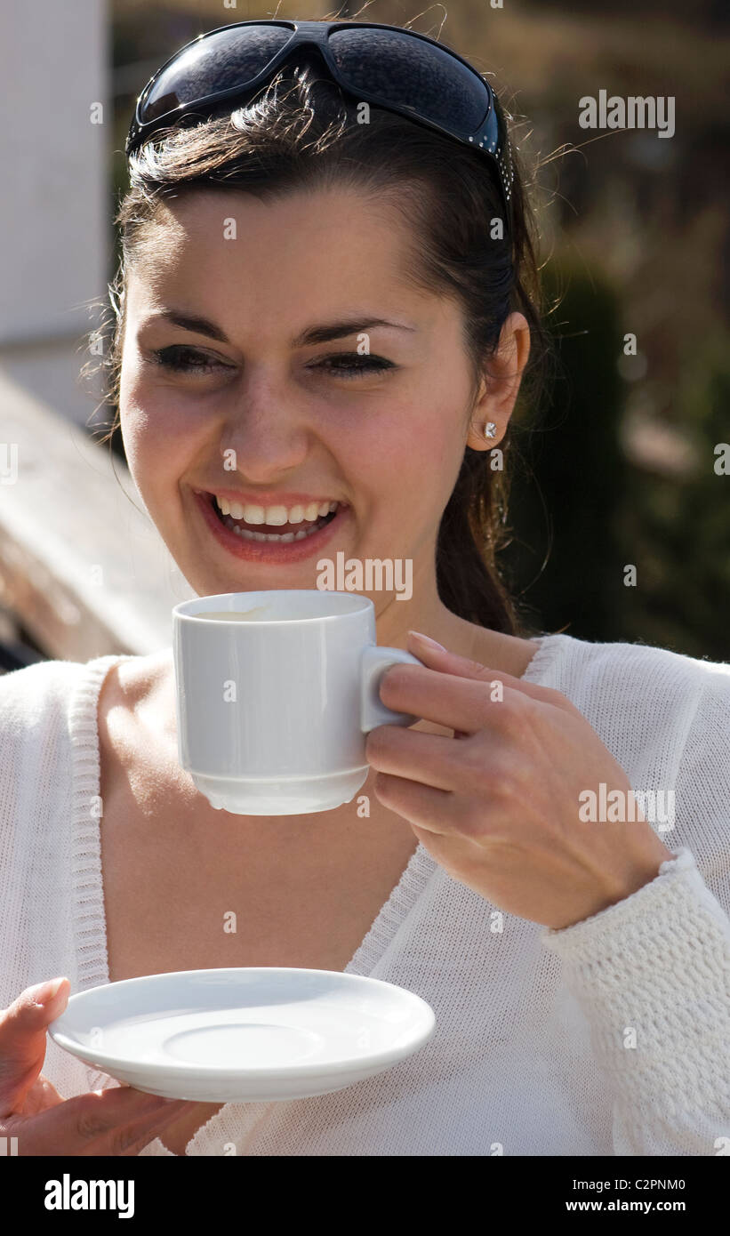 woman in cafe drinking coffee Stock Photo Alamy