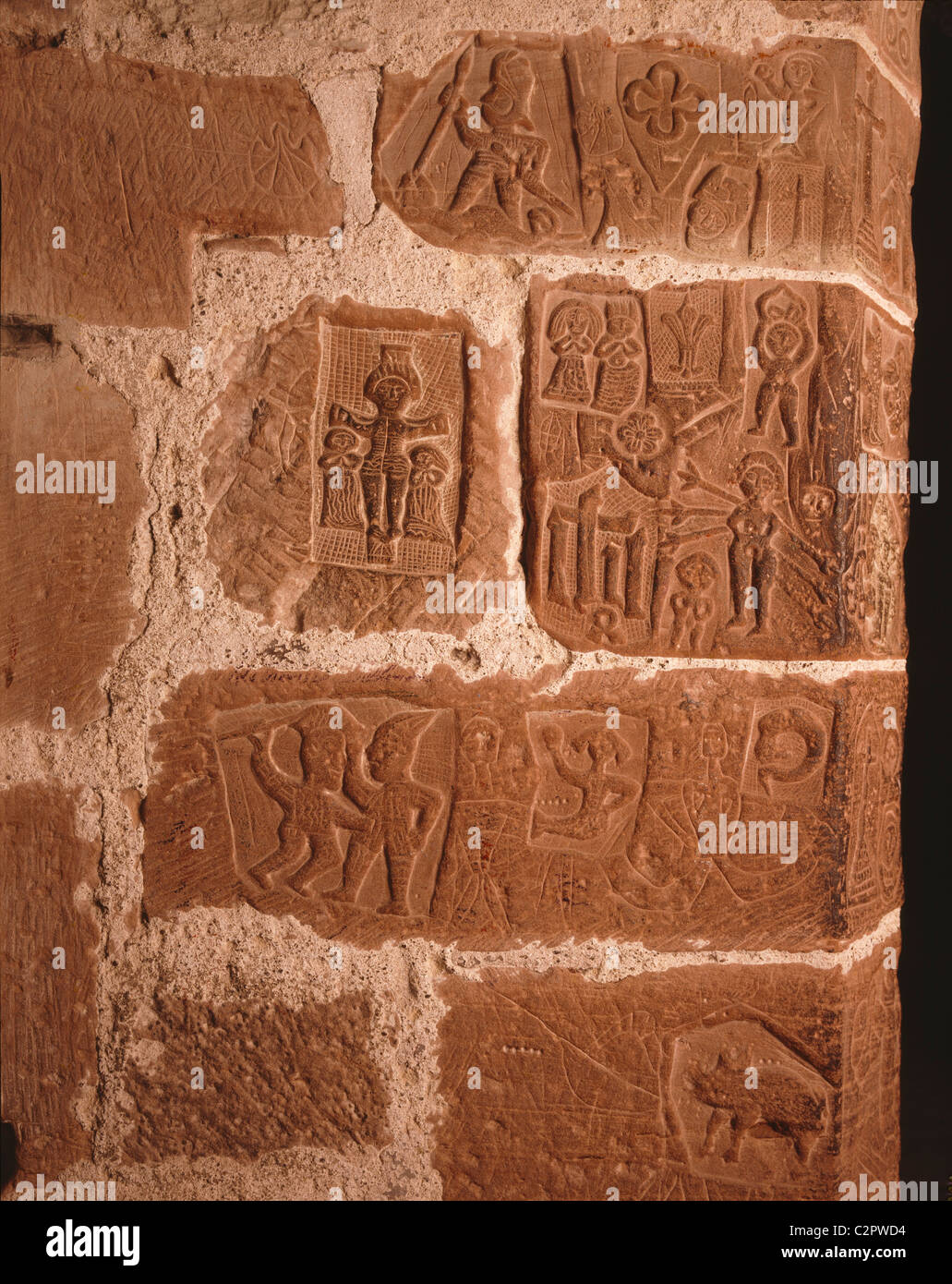 Carlisle Castle. Prisoners carvings dating to around 1480.. Stock Photo