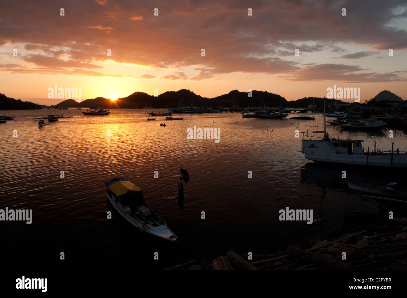 Sunset over Labuan Bajo, Flores, Indonesia Stock Photo - Alamy