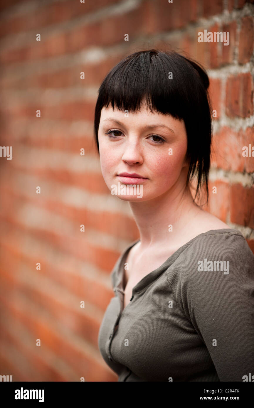 A Slim Teenage 18 19 20 Years Old Girl With Short Dark Hair