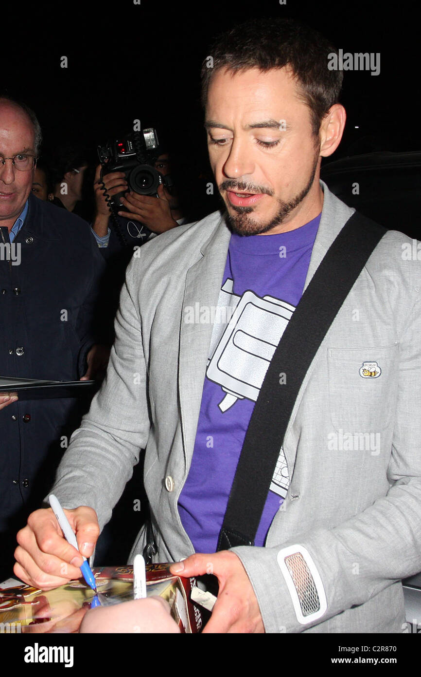 Rdj Sign Robert Downey Jr signs autographs while leaving Mr Chow restaurant ...