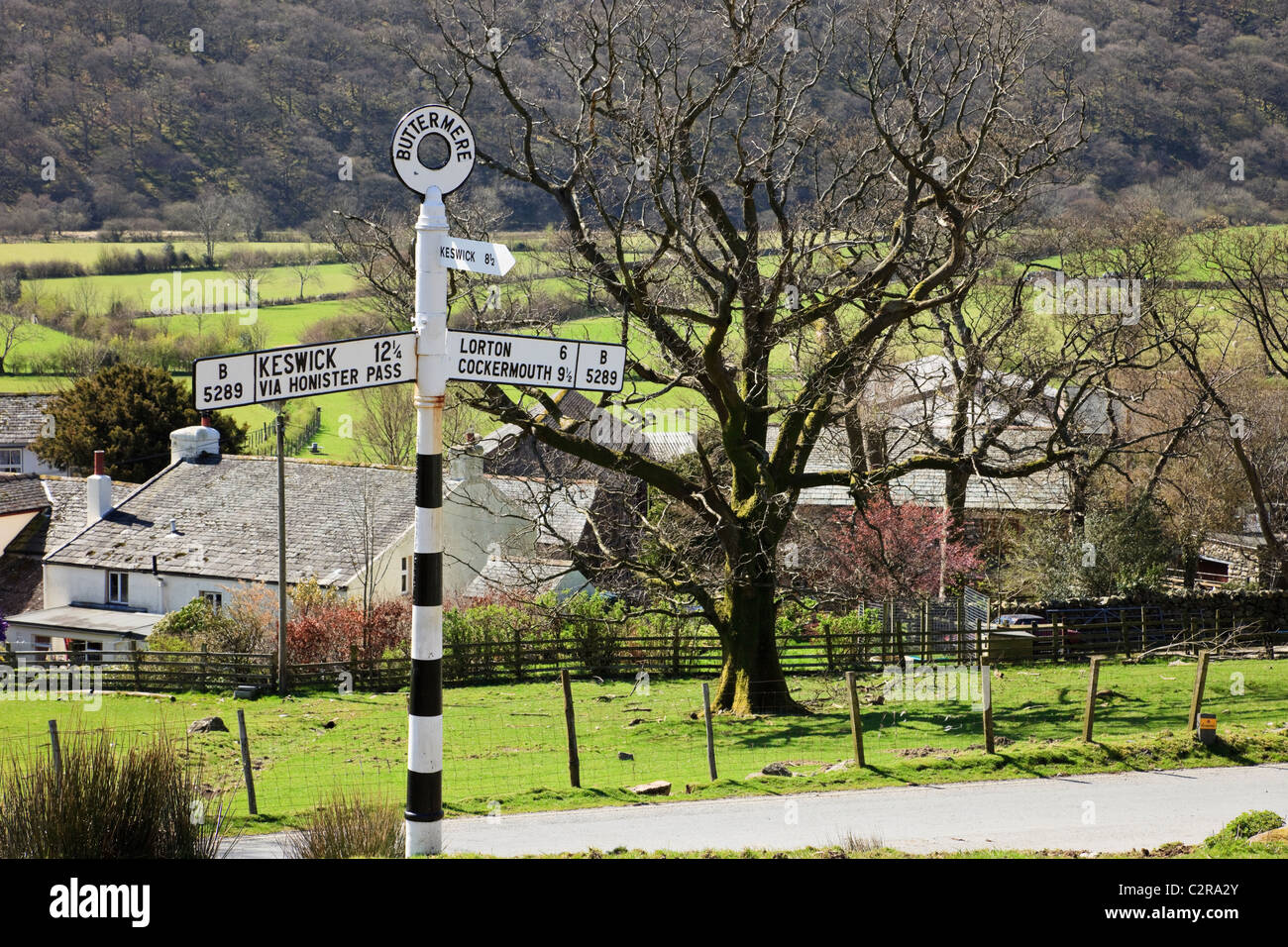 Road signpost at the crossroads to Newlands Pass in the Lake District National Park. Buttermere, Cumbria, England, UK, Britain. Stock Photo