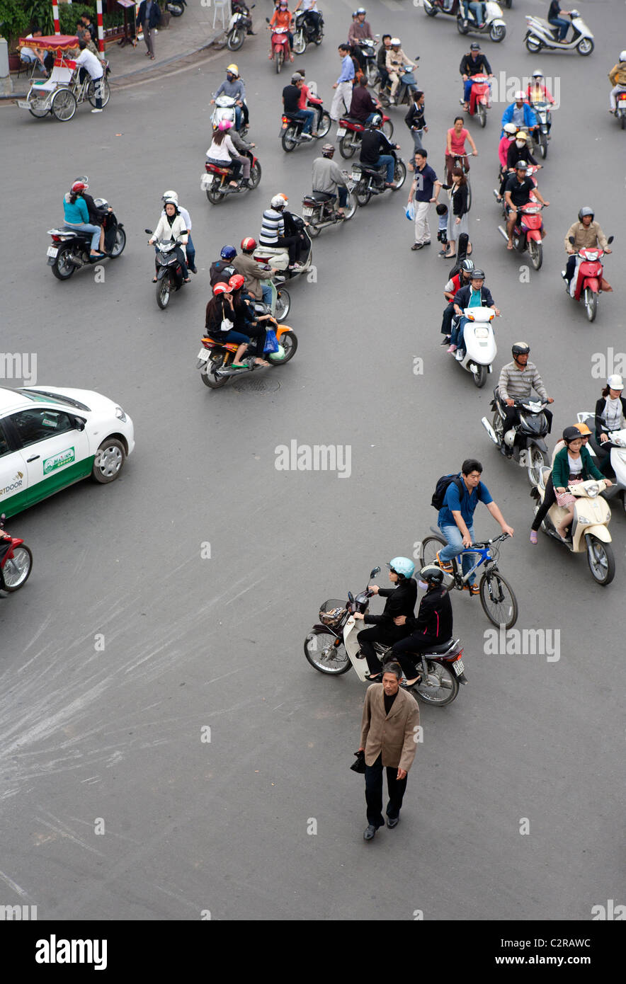 Busy road scene in the Old Quarter of Hanoi Stock Photo