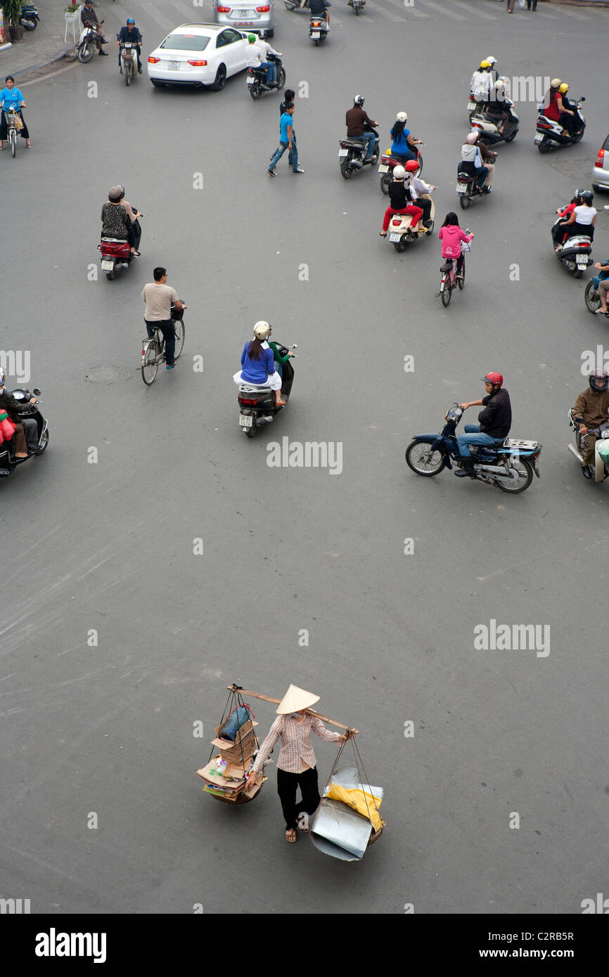 Busy road scene in the Old Quarter of Hanoi Stock Photo