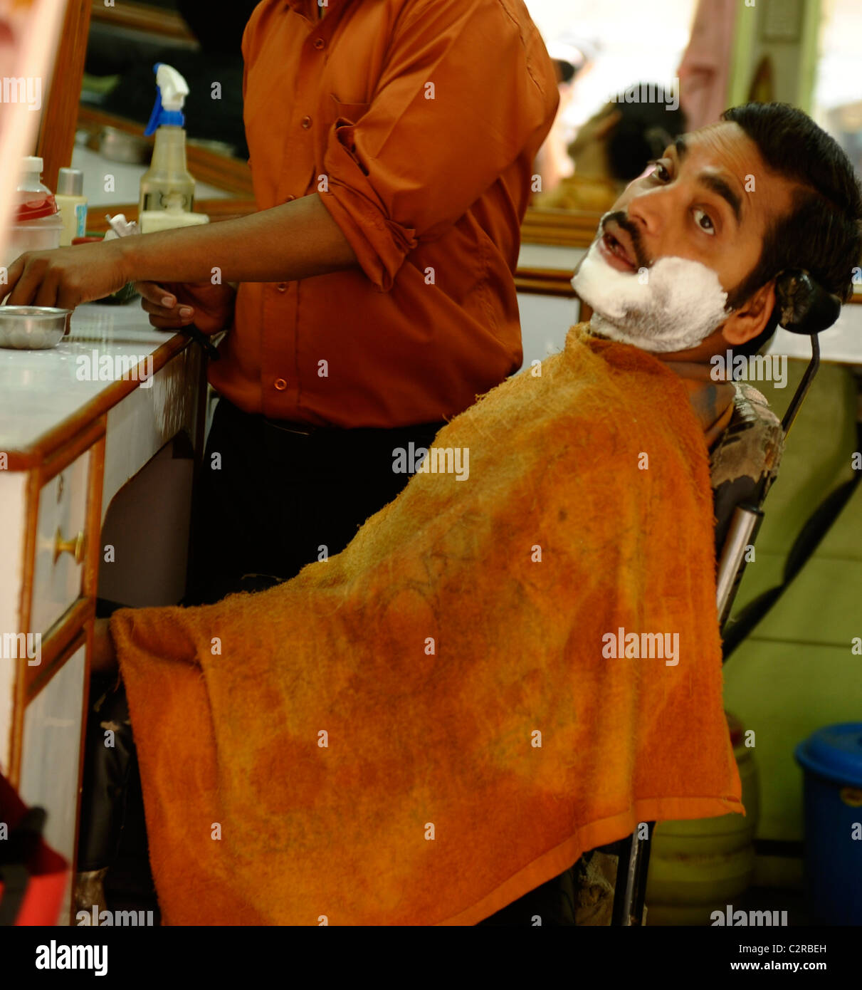 early morning shave , barbershop, kathmandu, nepal Stock Photo