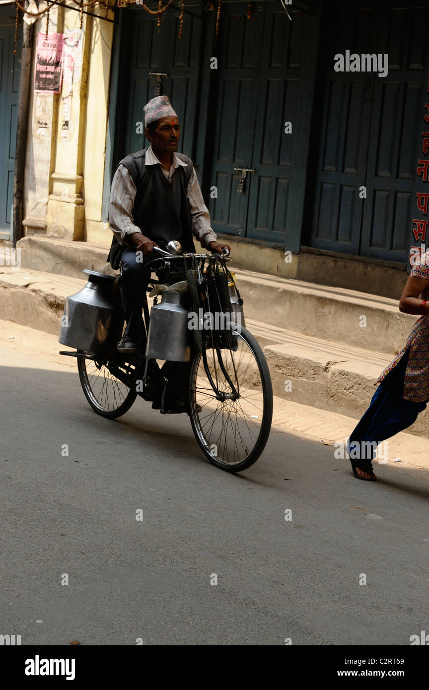 morning milk delivery , peoples lives ( the nepalis ) ,life in kathmandu , kathmandu street life , Nepal Stock Photo