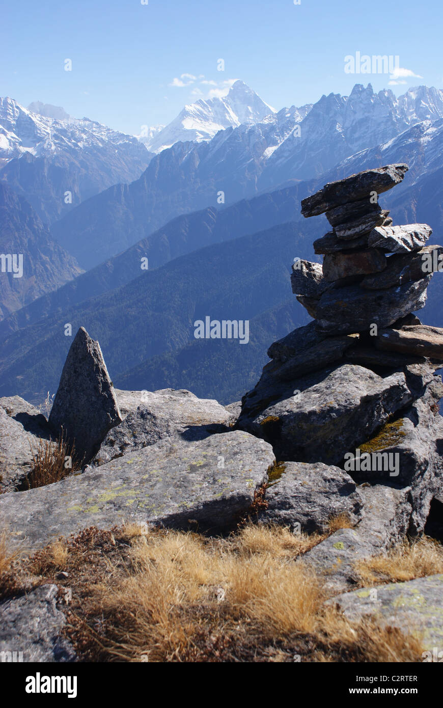 Garhwal Himalayas, India: Cairns near Gorson Top, with Nanda Devi behind. Stock Photo