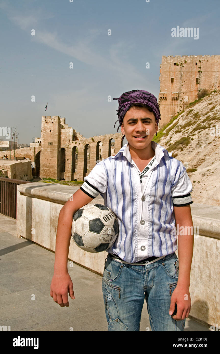 Young Boy Football Foot ball Soccer Aleppo Town City Syria Syrian Middle East Stock Photo