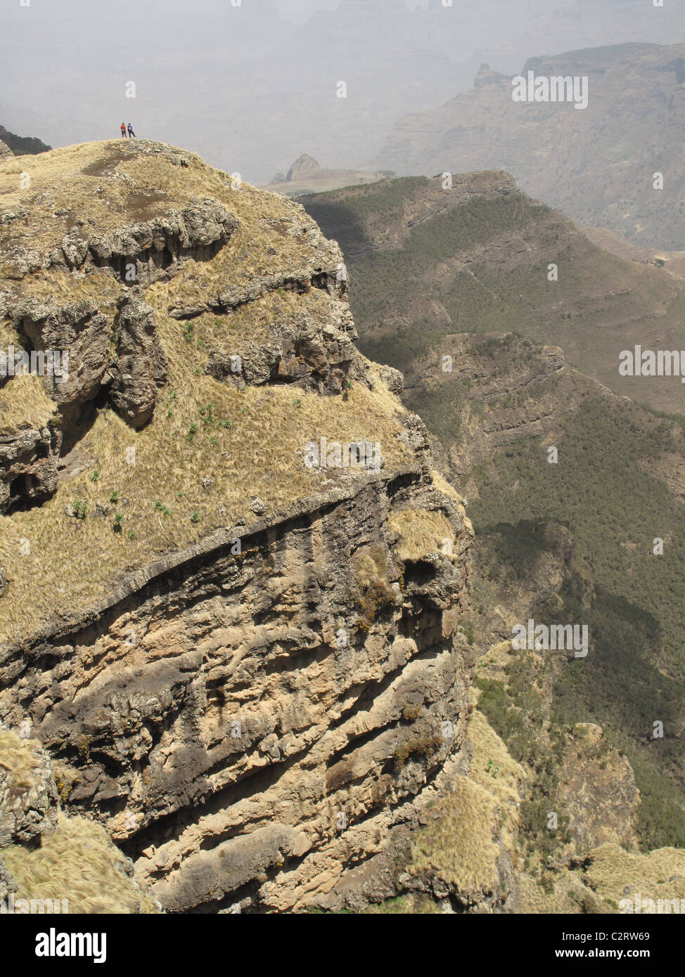 Simien Mountains, Northern Ethiopia: Trekkers take in the views from the escarpment rim, above Chenek camp. Stock Photo