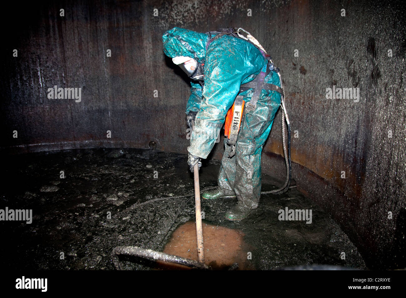 Industrial waste treatment plant, England cleaning inside chemicals