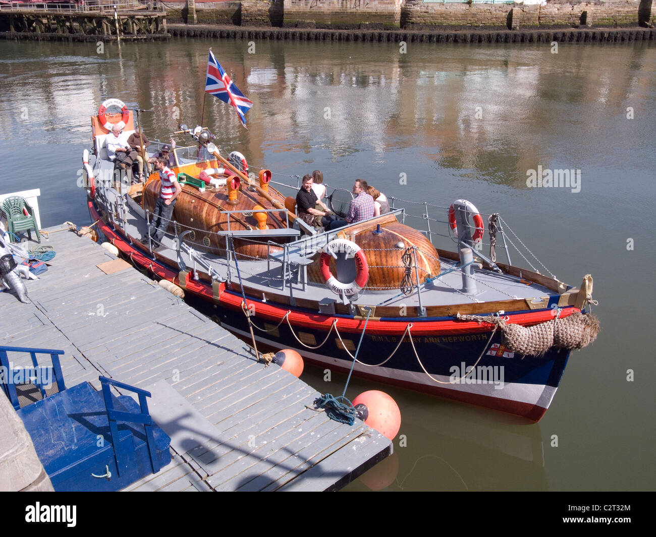 The old Whitby Lifeboat 'Mary Ann Hepworth' waiting for customers for spring pleasure trip in Whitby harbour Stock Photo