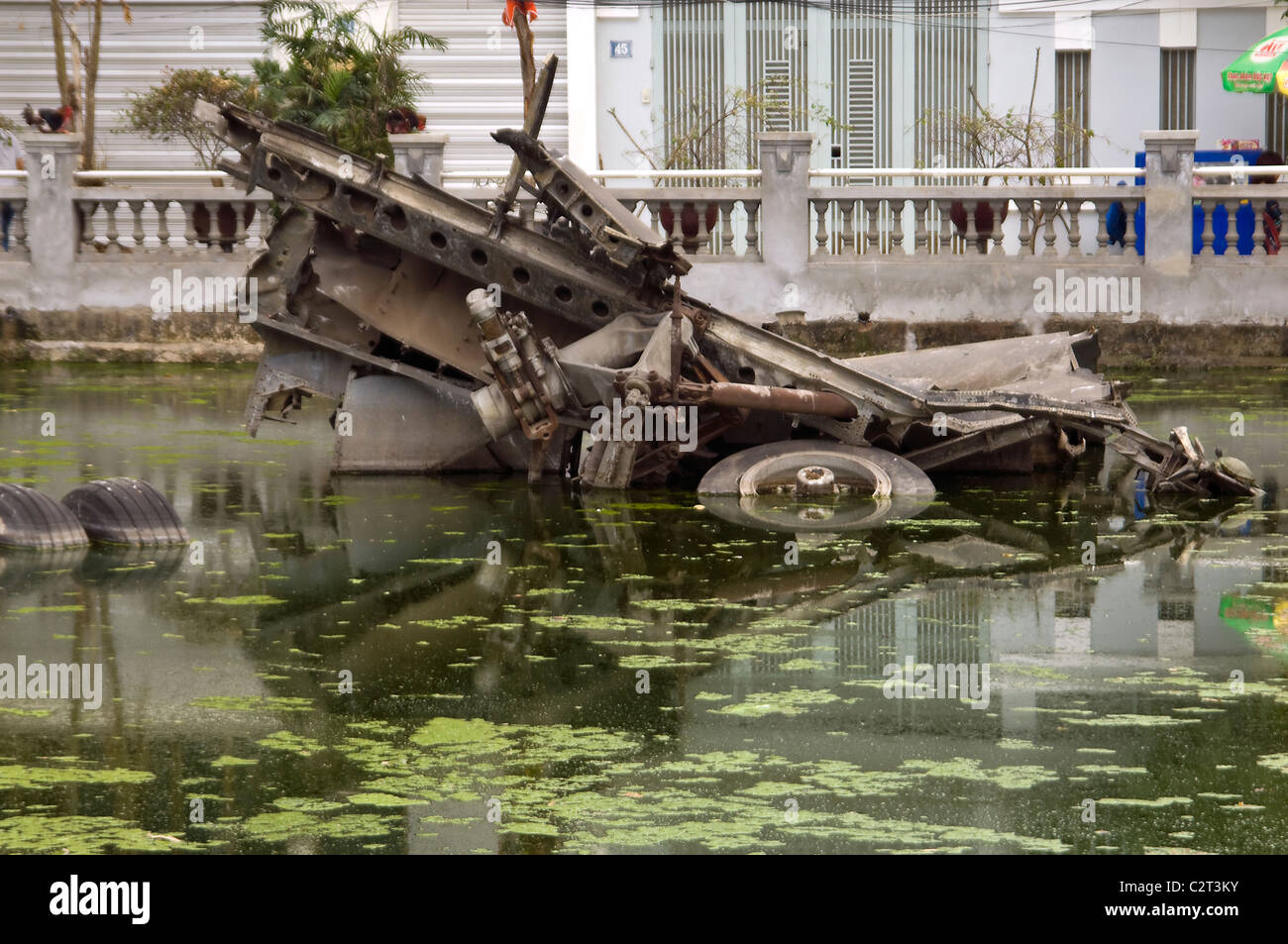Horizontal close up of the wreckage of an American B-52 bomber in Huu Tiep Lake in the centre of Hanoi. Stock Photo