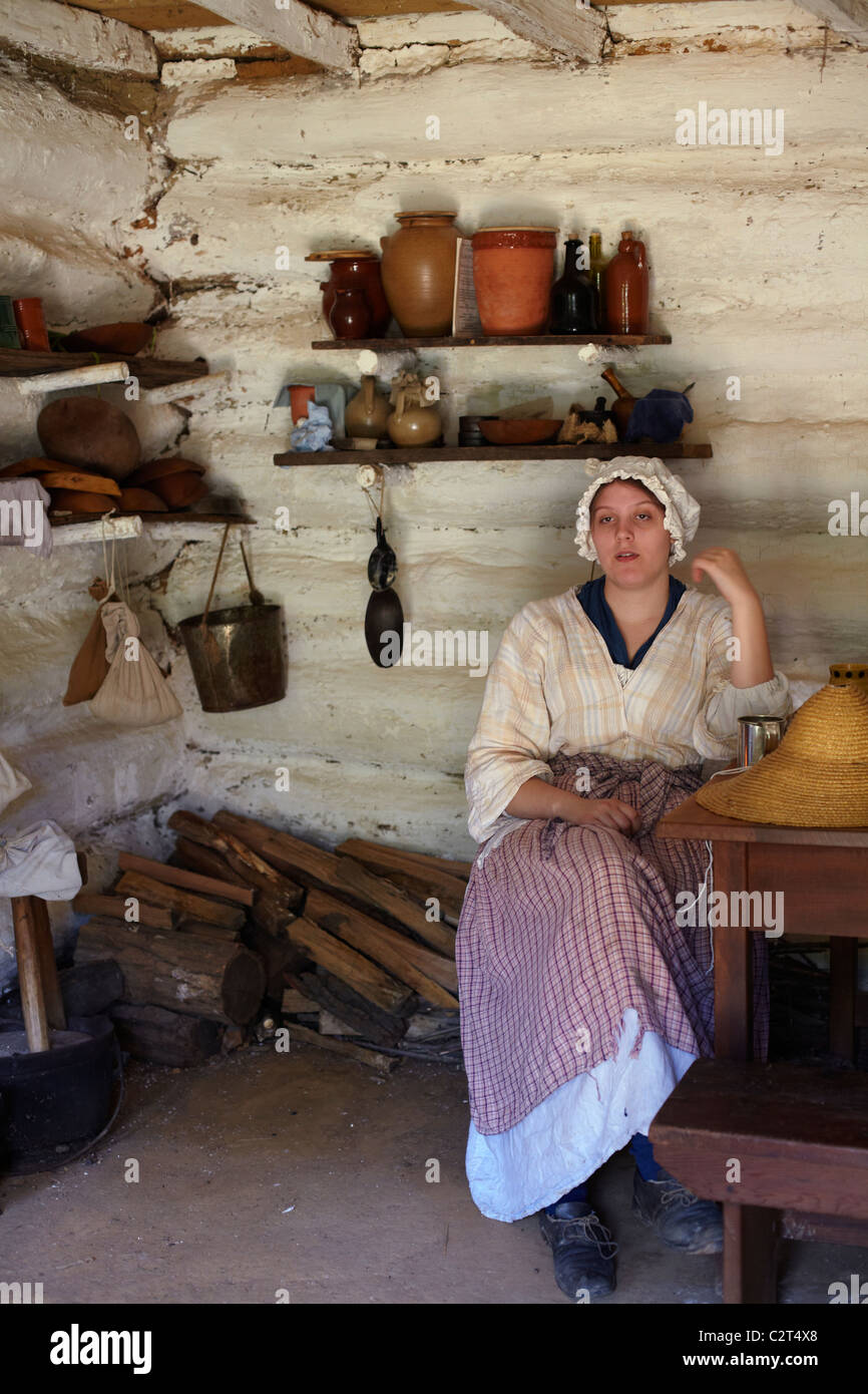 A costumed historical interpreter portraying the Farm Wife at Claude Moore Colonial Farm, McLean, Virginia. Stock Photo