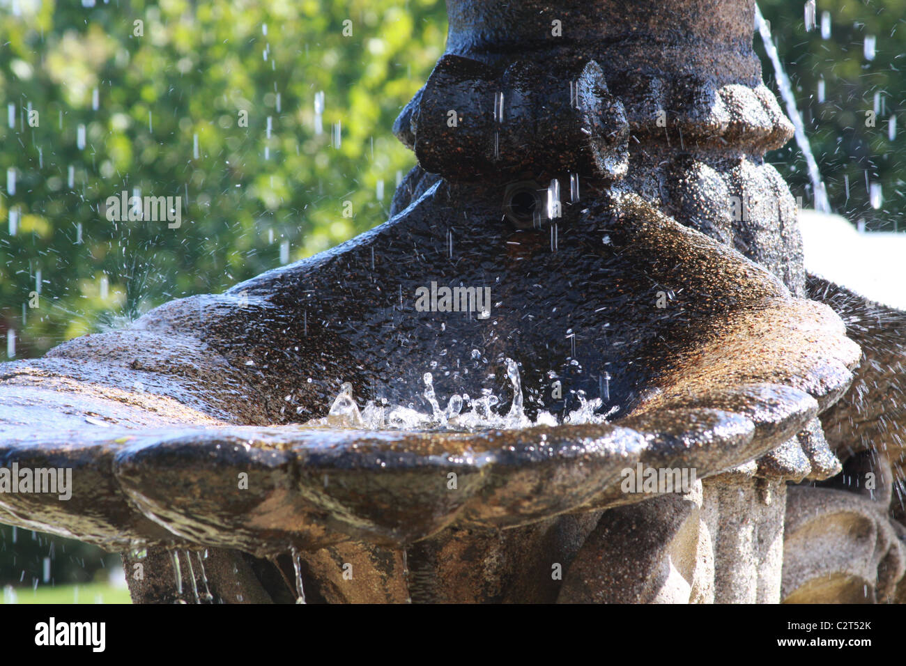 Water splashes in a fountain along the harbor walk in Bar Harbor Park, Maine. Stock Photo