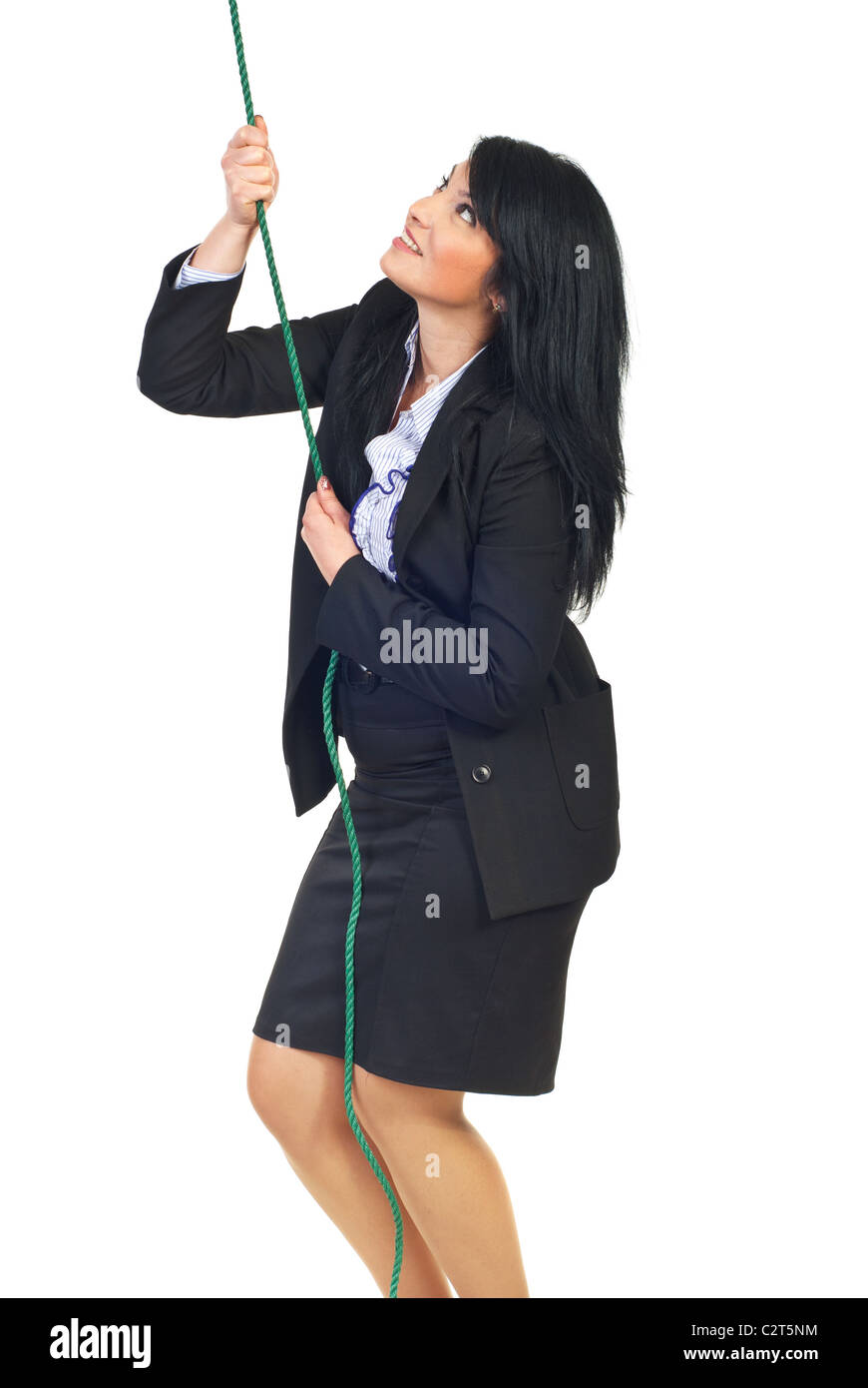 Smiling business woman trying to climbing a rope and aspirate to success isolated on white background Stock Photo