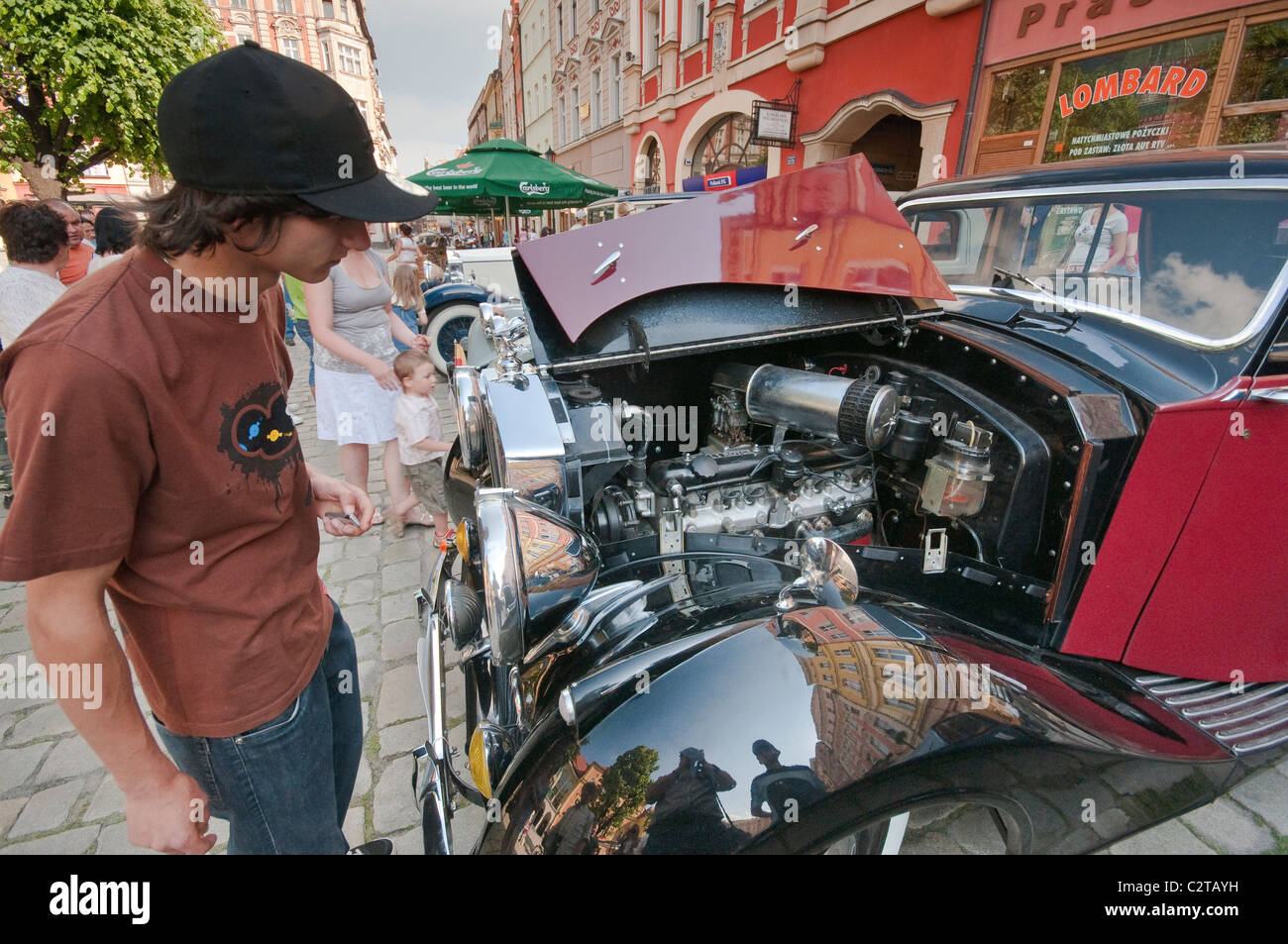 Checking under the hood of 1948 Rolls-Royce Silver Wraith at Rolls-Royce & Bentley Club meeting in Świdnica, Silesia, Poland Stock Photo