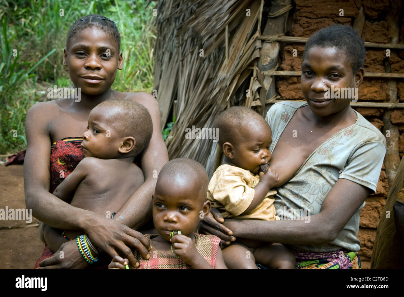 pygmies breastfeeding babies in the forest, Republic of Congo Stock Photo