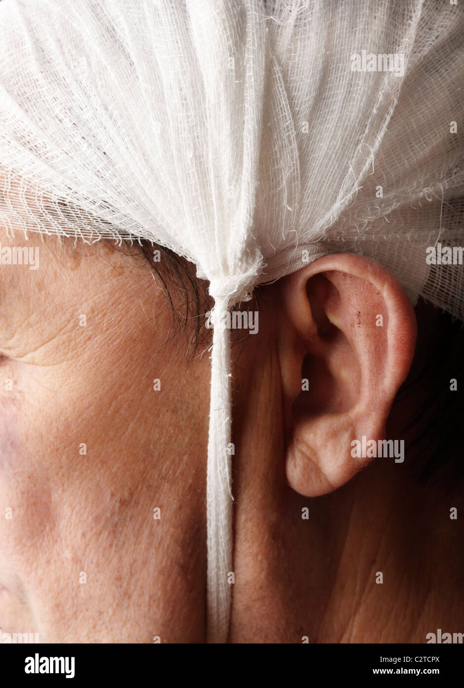 medical concept ,head of the mature man with bandage Stock Photo