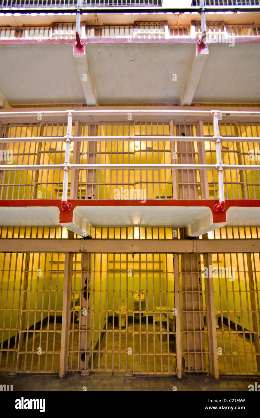 Three tiers of Cellblock C at the former Alcatraz Federal Prison in San Francisco Bay, CA. The corridor was called Michigan Ave. Stock Photo