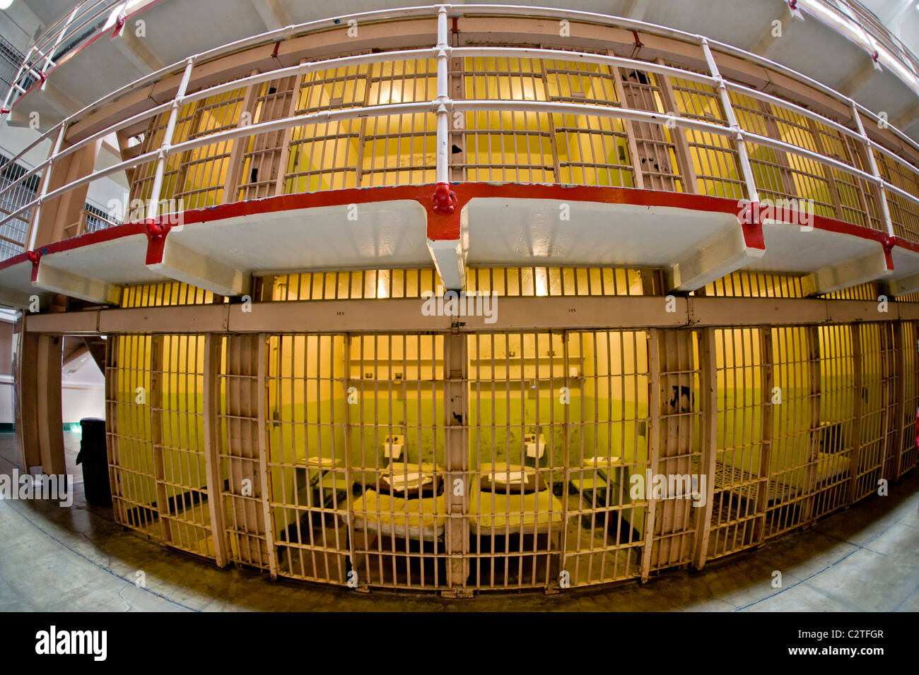 Two tiers of Cellblock C at the former Alcatraz Federal Prison in San Francisco Bay, CA, photographed with a fisheye lens. Stock Photo