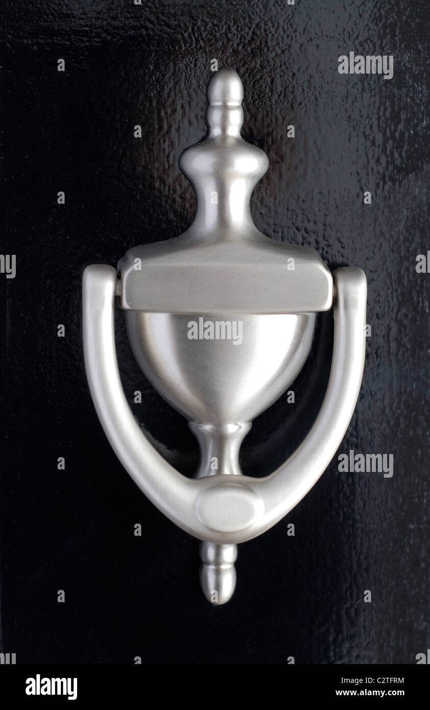 Brushed Nickel Formal Door Knocker On A Black Painted House Door